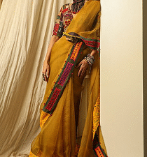 Multi color blouse yellow saree